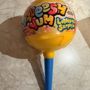 Squeezy Yum Lollipop Surprise Toy Squeesh Yum